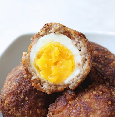 cross section of a keto scotch egg showing the soft yolk and firm white