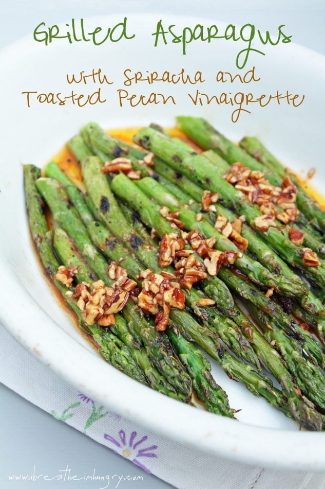 A delicious low carb grilled asparagus recipe with a Sriracha and pecan vinaigrette!