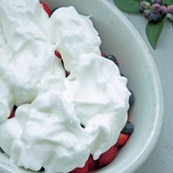 Keto meringue with summer berries before baking