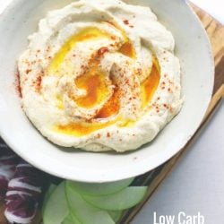 This low carb hummus is so delicious that you'd never know it was grain free and made with super healthy cauliflower! Keto, Atkins, and Paleo friendly! ibreatheimhungry.com