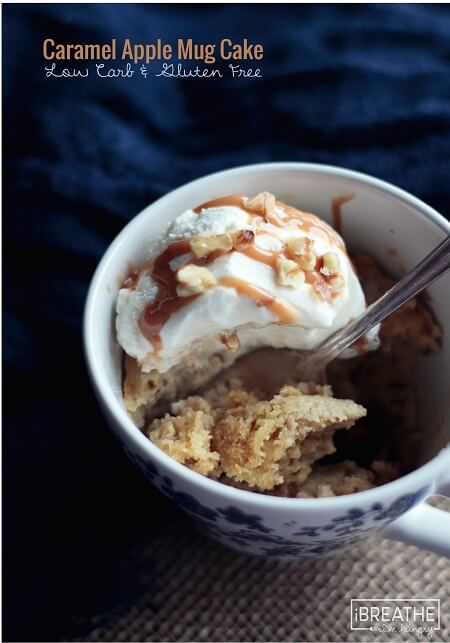 apple flavored mug cake with ice cream, caramel, and walnuts on top