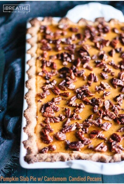 This low carb and gluten free pumpkin slab pie is my new favorite! The Cardamom Candied Pecans on top take it to the next level! Keto & Atkins friendly.