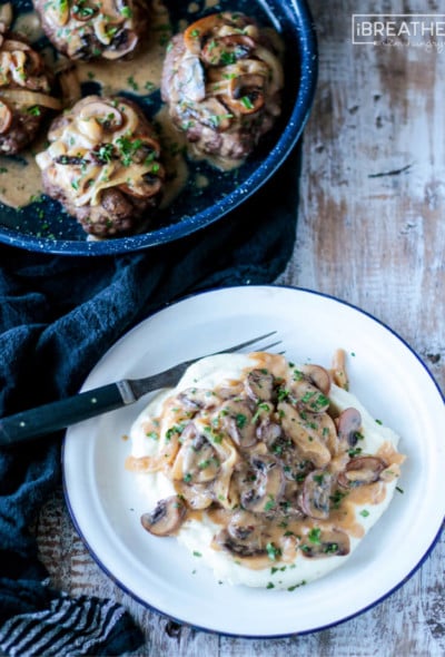 Baked in the oven, these easy low carb Salisbury Steaks are tender & delicious served with mushroom gravy.