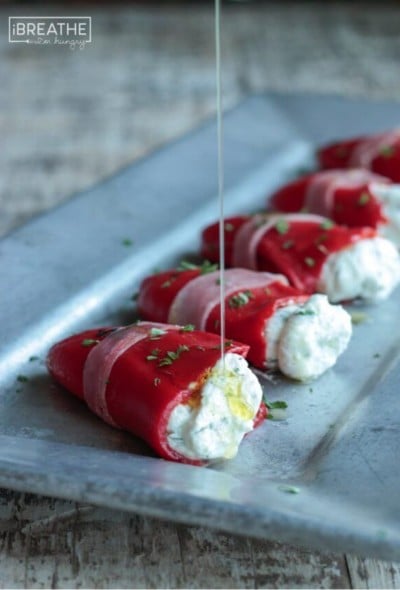 There's no cooking required for these easy low carb herbed goat cheese stuffed piquillo peppers! A great low carb appetizer or addition to an antipasto platter!