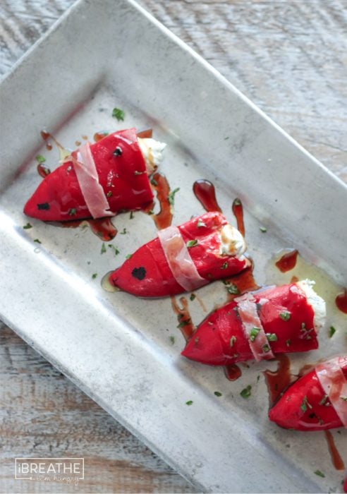 There's no cooking required for these easy keto herbed goat cheese stuffed piquillo peppers! A great appetizer or addition to a salad or antipasto platter!