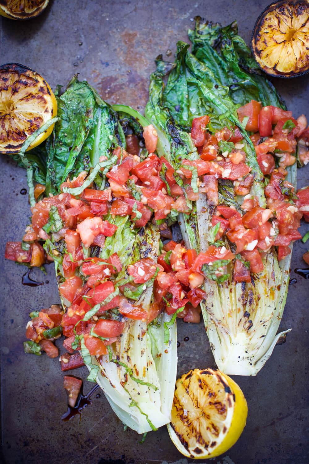 Grilled romaine with tomatoes and basil