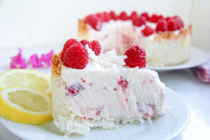 A gorgeous no bake keto raspberry cheesecake recipe with a hint of lemon and a coconut macaroon crust!