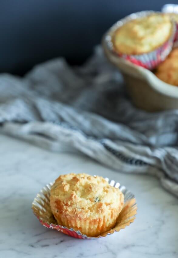 Keto Cheesy Herb Muffin on a marble background