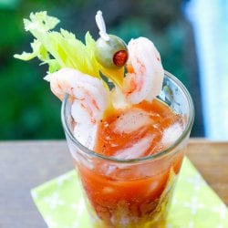Keto Bloody Mary top view with shrimp and olive garnish