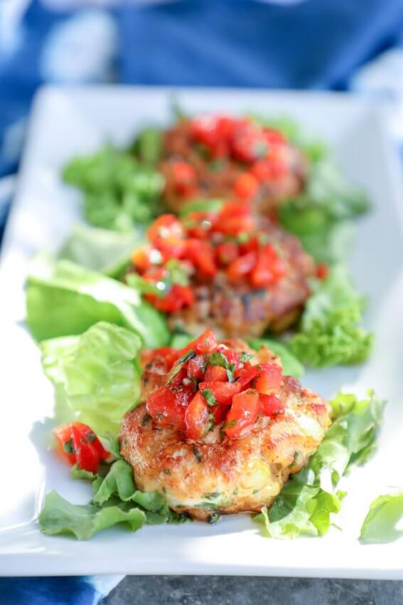 Keto Fish Cakes with Salsa on a bed of lettuce