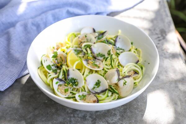 Keto Zoodles with White Clam Sauce with blue napkin
