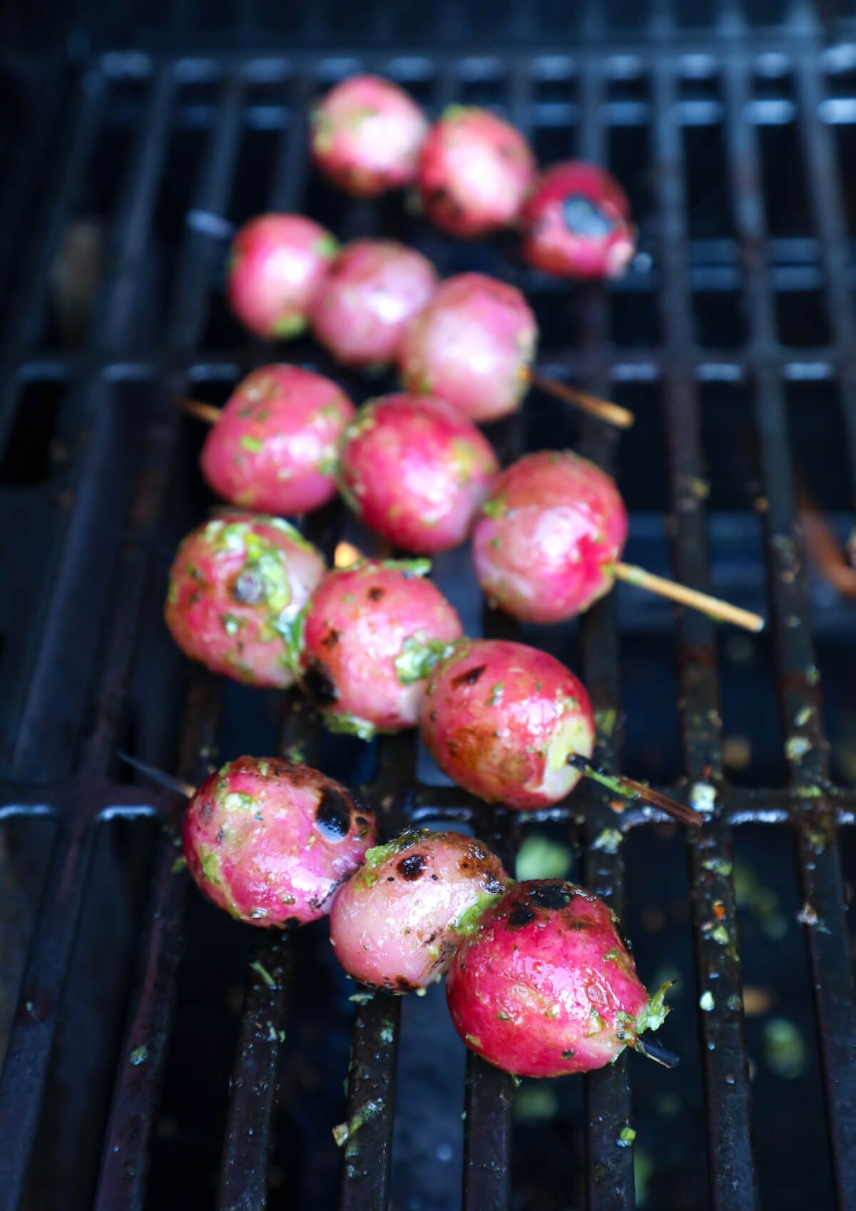 Radish Skewers on the grill, basted with herb butter
