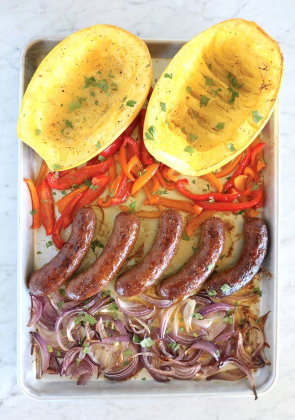 keto sheet pan sausage & peppers on a cookie sheet