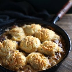 Keto Beef Stew & Cheesy Biscuit Crust in a cast iron pan