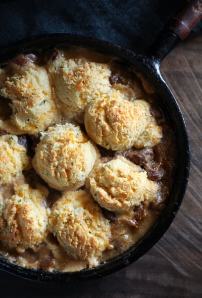 Keto Beef Stew & Cheesy Biscuit Crust on a wooden board