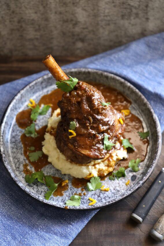 Top view of keto lamb shank on a bed of cauliflower puree