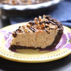 Keto Peanut Butter & Chocolate Pie side view on a yellow pottery plate