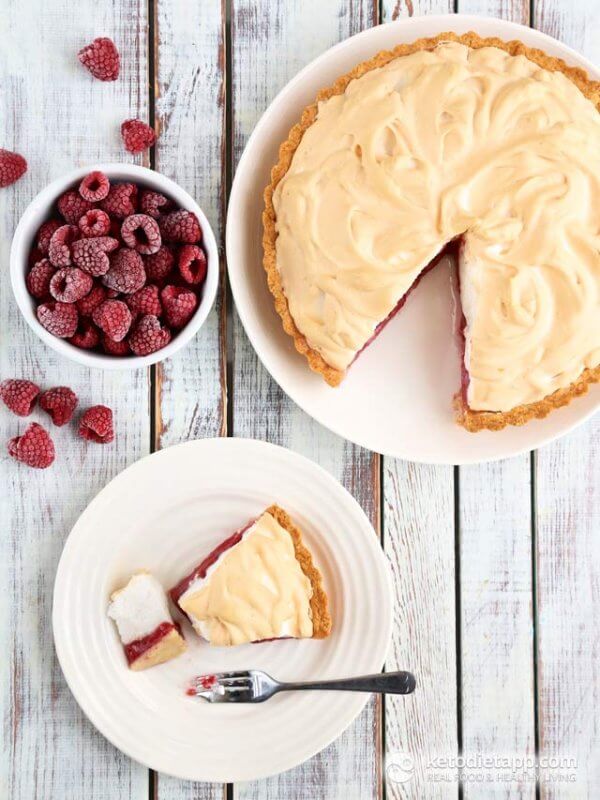 Raspberry Meringue Pie on a slatted white background