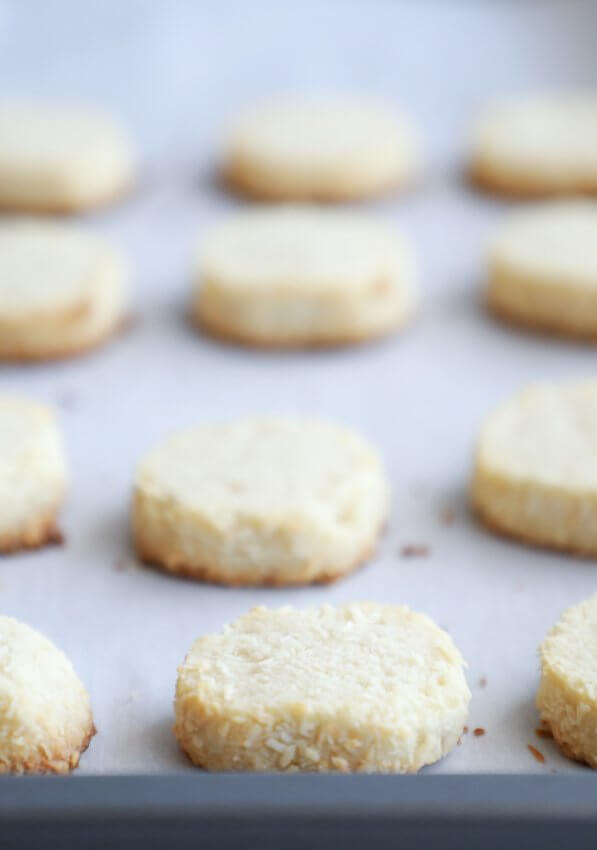 keto coconut shortbread cookies on a parchment lined baking sheet