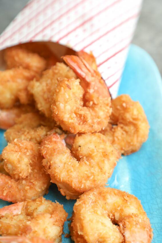 Keto Coconut Shrimp spilling out of a paper cup