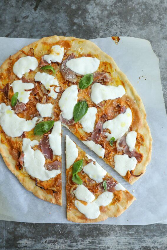 Keto Pumpkin & Prosciutto Pizza from above with one slice cut out