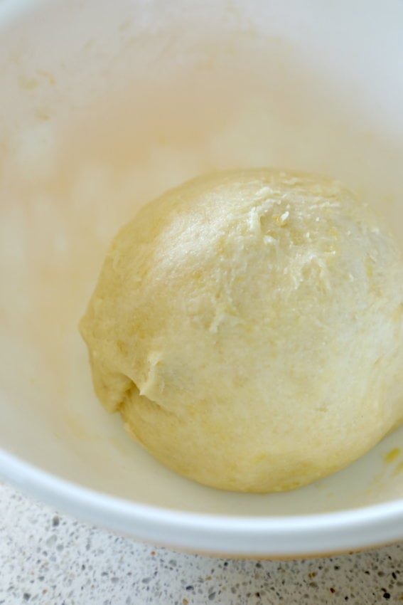 Easy Keto Dough in a finished ball in a white bowl.