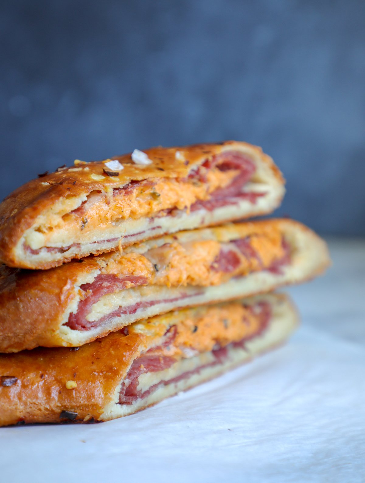 Keto Stromboli pieces stacked on top of each other - Keto Dinner Ideas