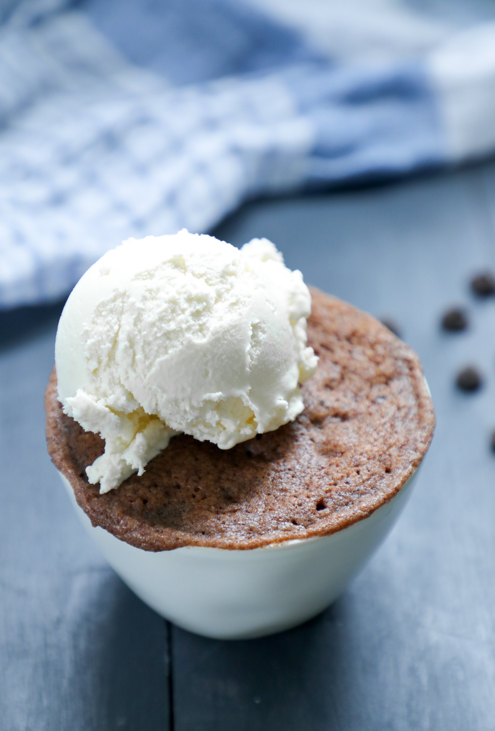 Keto Chocolate Mug Cake with a scoop of vanilla ice cream