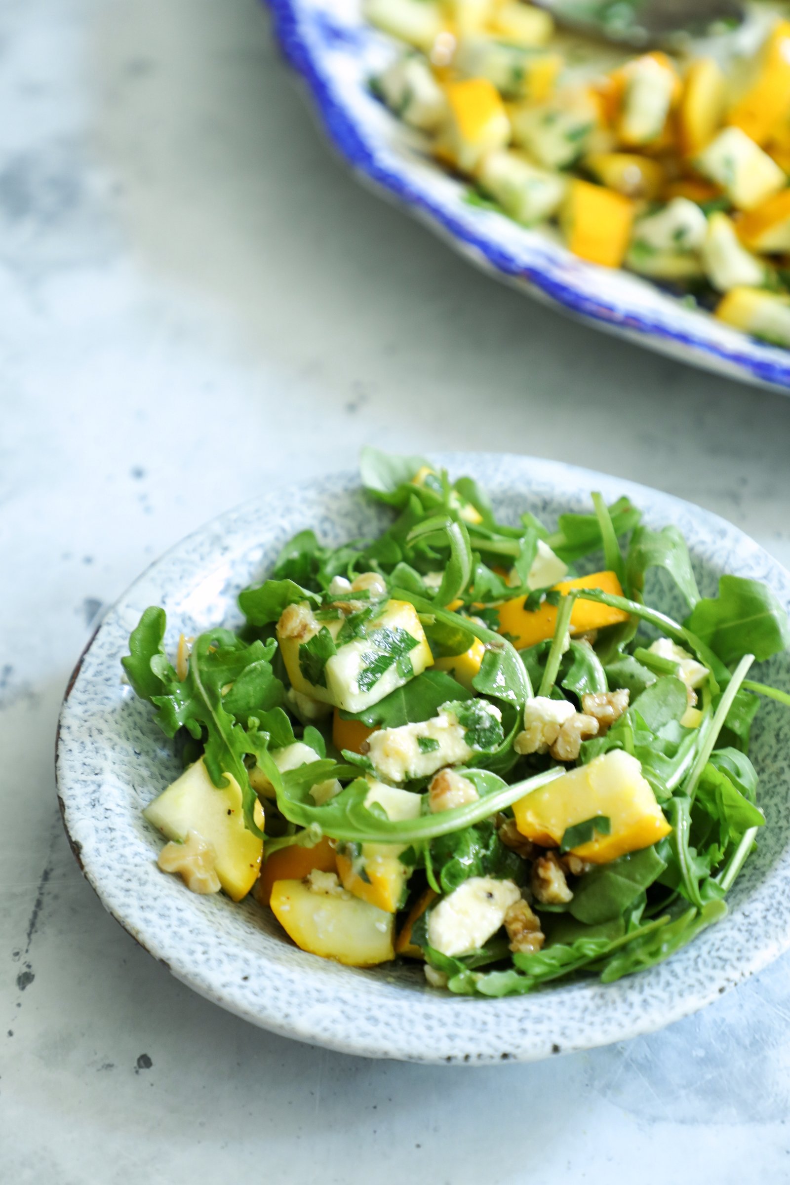keto summer squash salad served with fresh arugula as a variation on the recipe