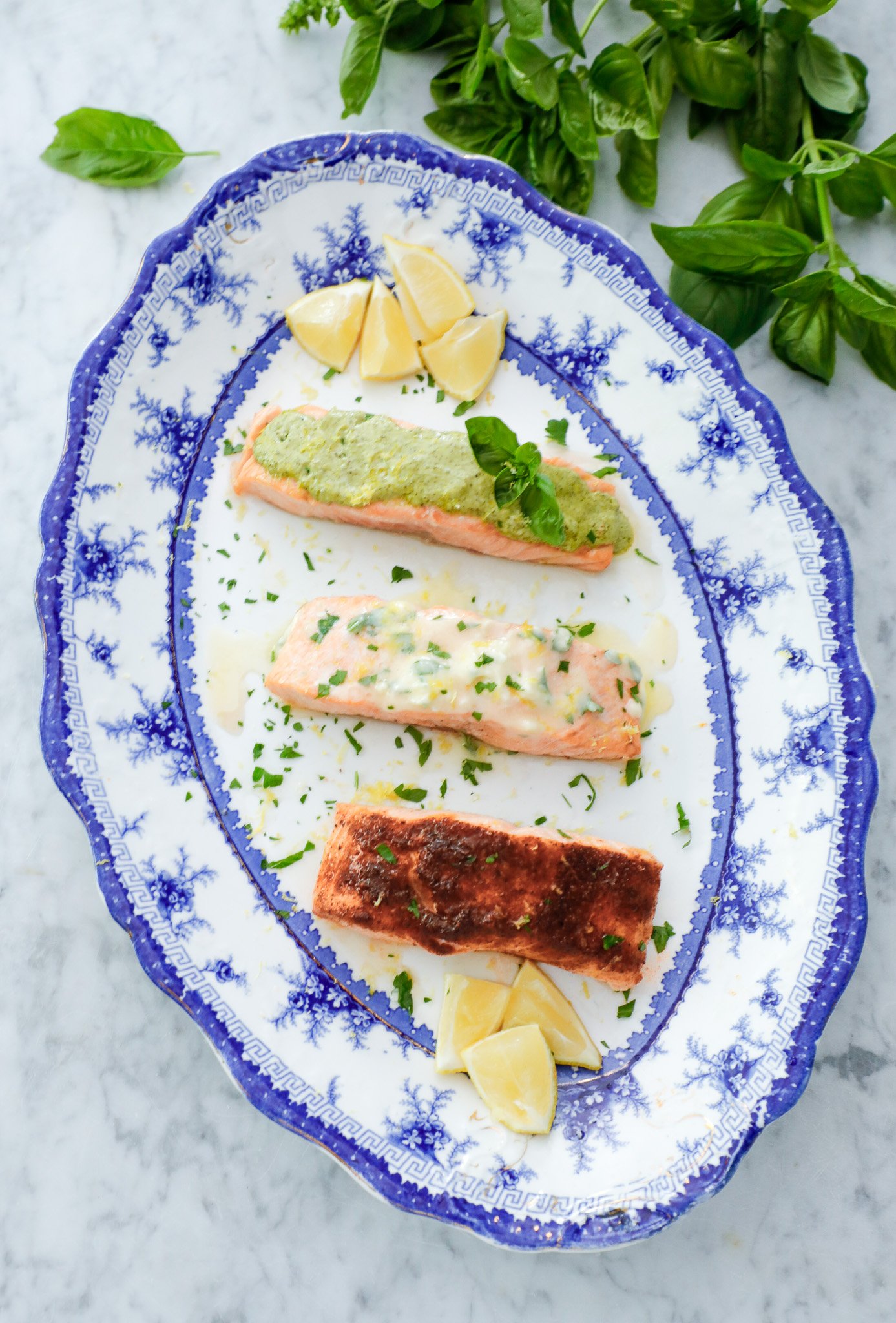 air fryer salmon 3 ways on a blue and white platter