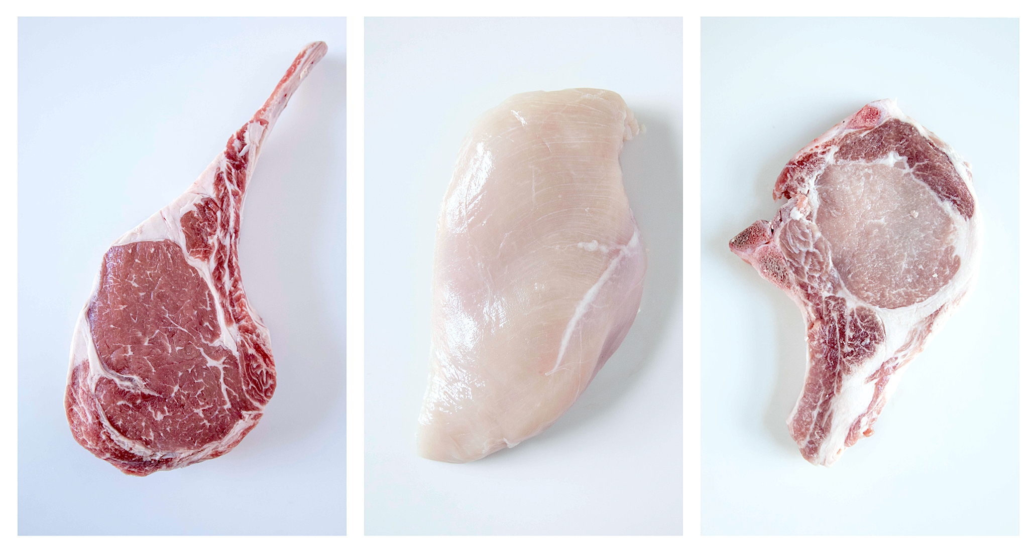 Raw meat on a white background. Tomahawk steak, chicken breast, and bone in pork chop